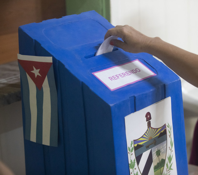 Detail of the hand of a person exercising their right to vote during the referendum on the new family code today, in Havana