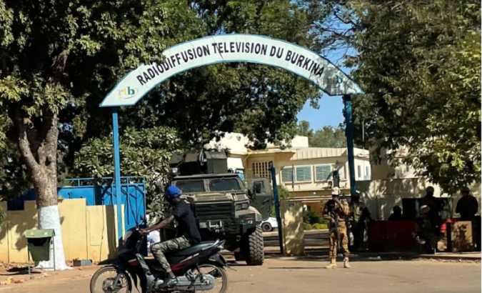 Soldiers set up at the entrance to the national public television station, Ouagadougou, Burkina Faso, Sept. 30, 2022.