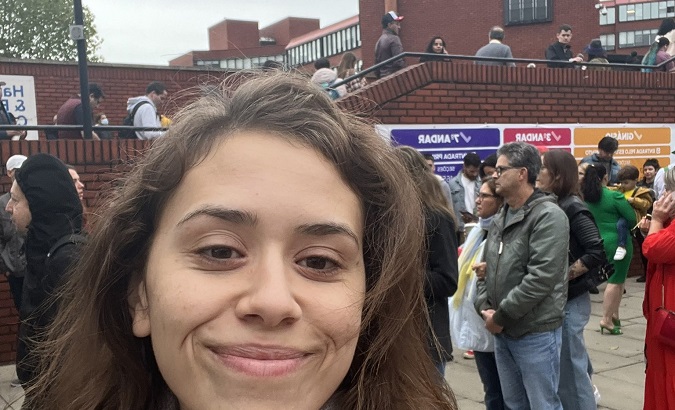 A Brazilian woman posts a selfie after voting for Lula da Silva in London, U.K., Oct. 2, 2022.