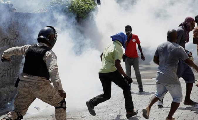 Police attack protesters, Haiti, Oct. 9, 2022.