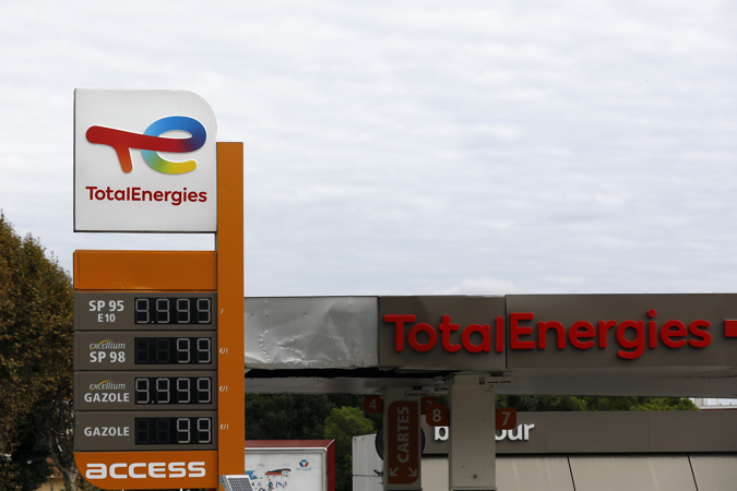 The Total Energies logo at a Total Energies gas station in Nice, France, 10 October 2022. French gas stations are affected by a shortage of petrol due to strikes in refineries.