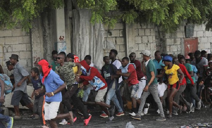 People fleeing from police repression, Haiti, Oct. 2022.