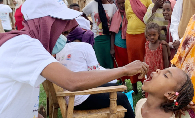 A girl receives oral cholera in Shashemene, Ethiopia, 2022.