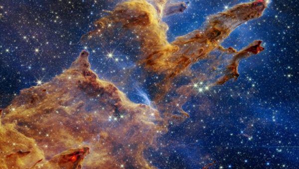 Photo posted on NASA website on Oct. 19, 2022 shows the Pillars of Creation set off in a kaleidoscope of color in NASA's James Webb Space Telescope's near-infrared-light view.
