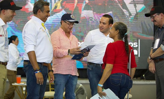 President Gustavo Petro hands over land titles, Oct. 20, 2022.