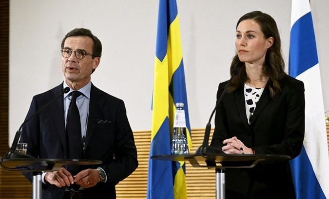 Sweden's PM Ulf Kristersson (L) and Finland's PM Sanna Marin (R), Nov. 1, 2022.