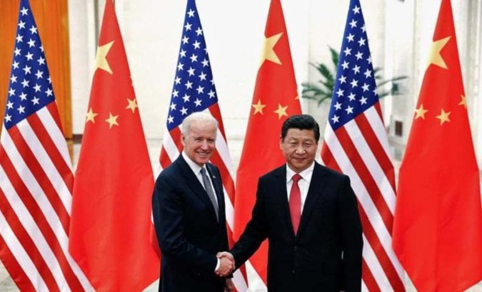 File photo of U.S President Joe Biden (L) & China's President XI Jinping (R).