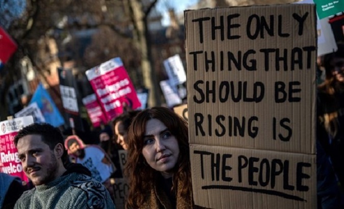 People protesting against inflation, U.K., 2022.