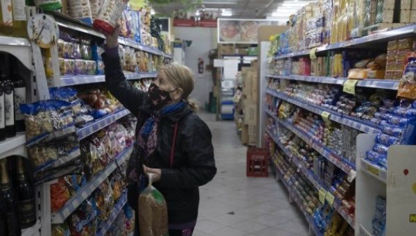 A woman shops at a supermarket, in the city of Buenos Aires, capital of Argentina, on April 13, 2022.