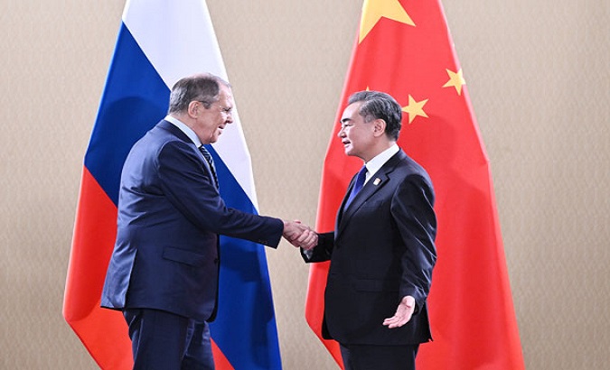 Chinese Foreign Minister Wang Yi met with his Russian counterpart Sergey Lavrov in Bali, Indonesia on Tuesday. Nov. 15, 2022.