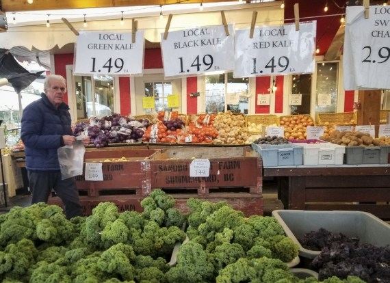 A customer shops for food at a farmers' market in Richmond, British Columbia, Canada, on Nov. 16, 2022.