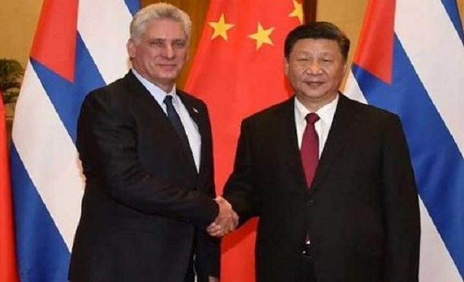 File photo of Cuban President Miguel Diaz-Canel (L) & Chinese President XI Jinping (R).