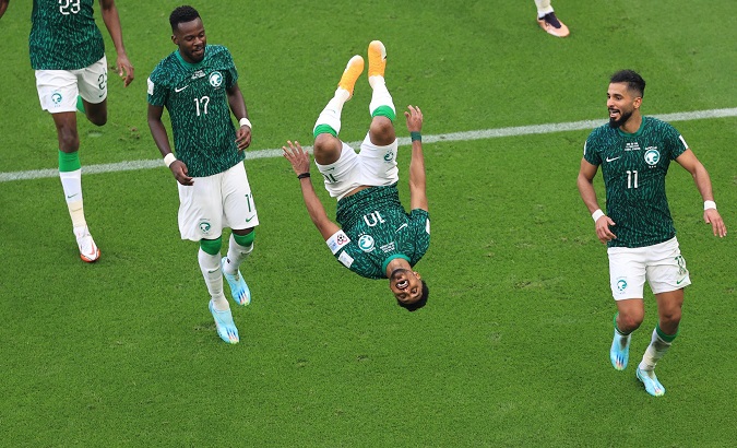 Saudi Arabian players celebrate a goal against Argentina, Nov. 22, 2022.