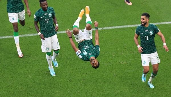Saudi Arabian players celebrate a goal against Argentina, Nov. 22, 2022.