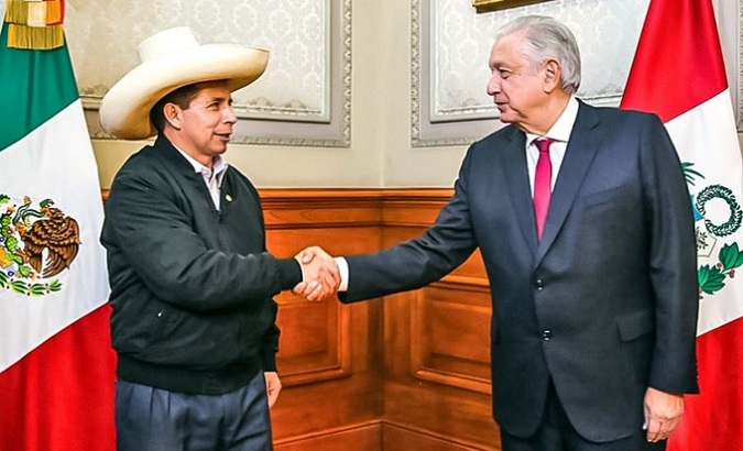 Peru's President Pedro Castillo (L) & Mexican President Andres Manuel Lopez Obrador (R).