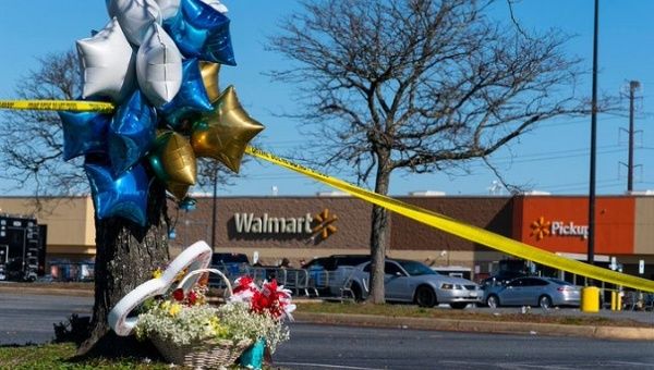 Flowers and decorations in memory of Walmart shooting victims, Chesapeake, U.S., Nov. 23, 2022.