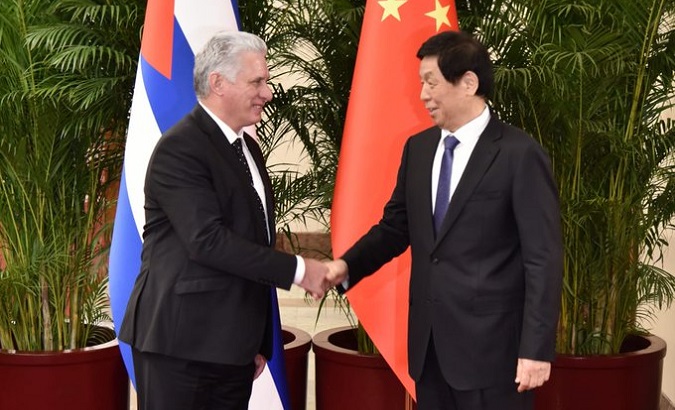Cuban President Miguel Diaz-Canel (L) & Chinese lawmaker Li Zhanshu (R), Nov. 25, 2022.