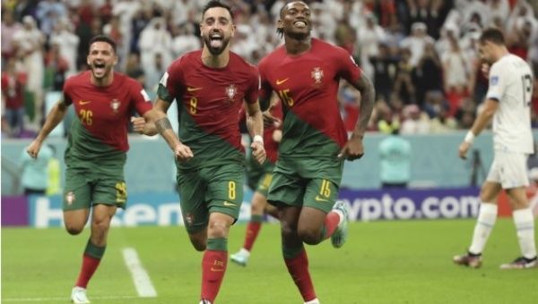 Bruno Fernandes (2nd L) of Portugal celebrates his penalty goal during the Group H match against Uruguay at the 2022 FIFA World Cup at Lusail Stadium in Lusail, Qatar on Nov. 28, 2022.