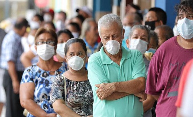 People at a vaccination center, Dec. 7, 2022.
