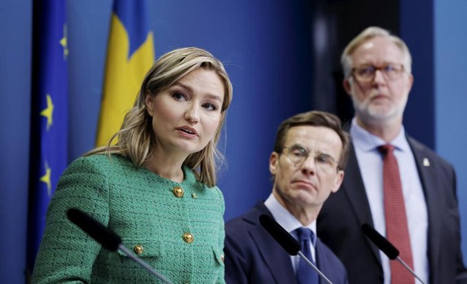 Energy Minister Ebba Busch (L), PM Ulf Kristersson (C), and Labor Market Minister Johan Pehrson (R), Dec. 9, 2022.