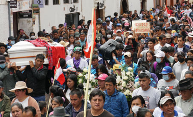 Peruvians accompany the coffin of one of the victims of state terrorism, Ayacucho, Dec. 17. 2022.