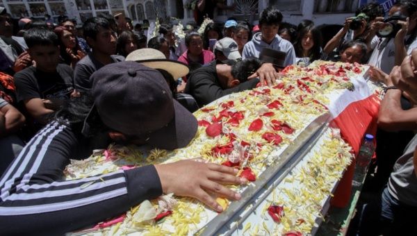 Mourners cry as civilians killed for protesting in Peru are buried