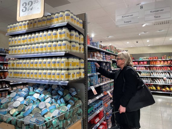 A woman shops at a supermarket in Stockholm, Sweden, Sept. 14, 2022.