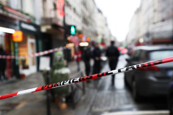 Caution tape is pictured at the scene where a shooting took place in Paris, France, Dec. 23, 2022.