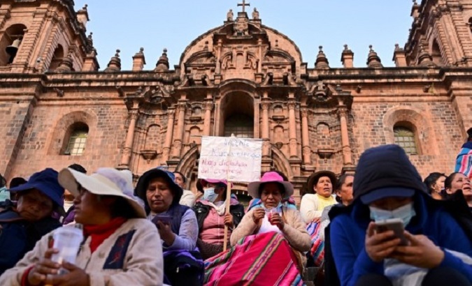 Peruvians make a peaceful sit-in.