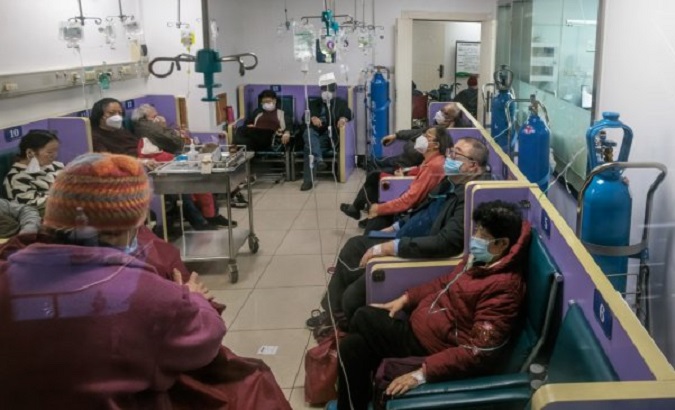 Patients get oxygen at a health center in China, 2023.