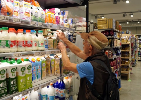 An elderly customer shops at a supermarket in Rome, Italy, Oct. 29, 2022.