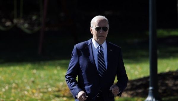 U.S. President Joe Biden walks on the South Lawn to board Marine One at the White House in Washington, D.C., the United States, on Oct. 27, 2022.