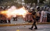 Peruvian police fire at citizens in Lima, Jan. 30, 2023.