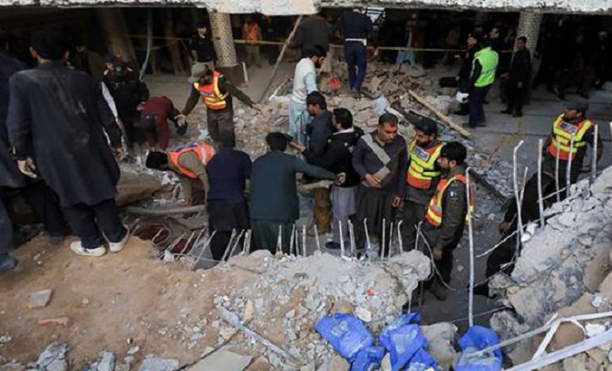 Rescuers among the rubble of the Mosque, Pakistan, Jan. 30, 2023.