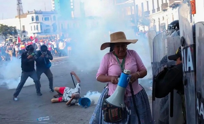 Police violently disperse a march in Lima, Peru, Jan. 30, 2023.
