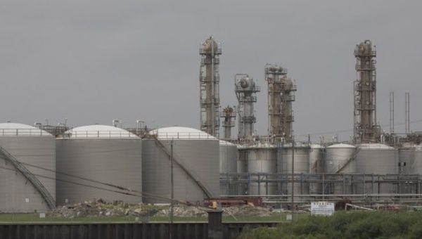 Refinery and storage tanks are photographed across the Buffalo Bayou in La Porte, Texas, the United States, on June 26, 2019.