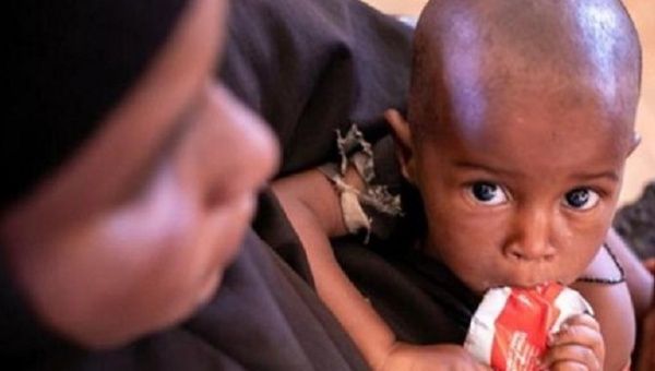 Somali boy receives food assistance, 2023.