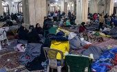 Families shelter at a mosque in Aleppo, Syria, Feb. 2023.