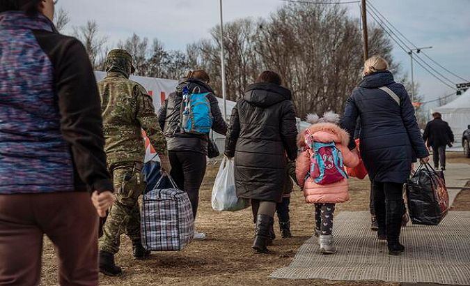 People flee the armed conflict in Ukraine.