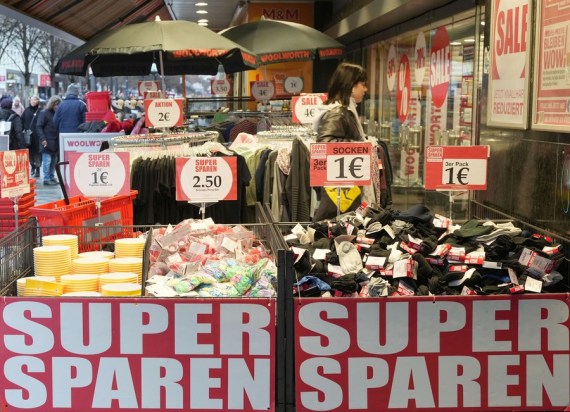 A woman visits a store with discount signs in Berlin, Germany, on Feb. 1, 2023.