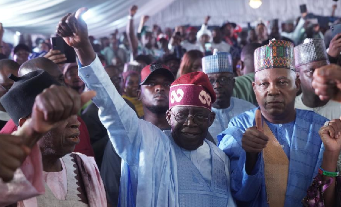 Bola Tinubu (C) celebrates his victory in Abuja, Nigeria, March 1, 2023.
