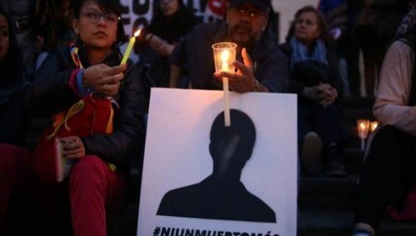 Colombians protest against assassinations of social leaders.