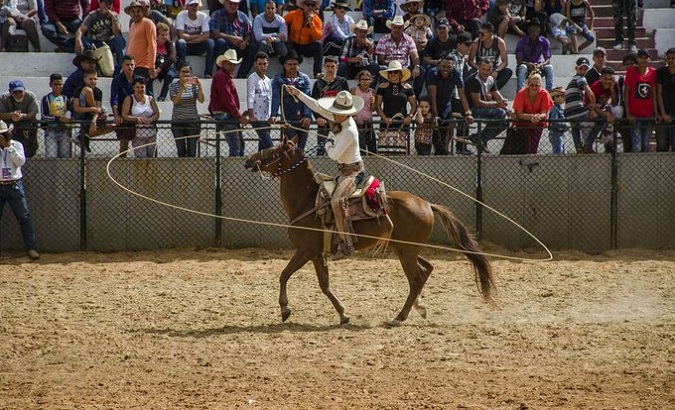 A Mexican charro performs a demonstration during the international fair in Cuba.