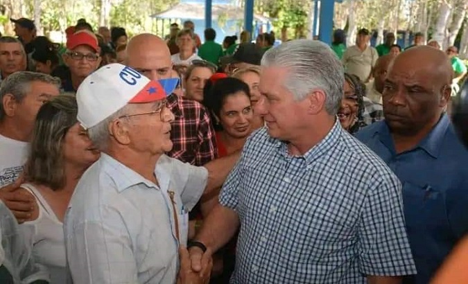 Cuban President Miguel Diaz-Canel (R) in Villa Clara.