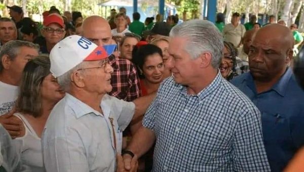 Cuban President Miguel Diaz-Canel (R) in Villa Clara. 