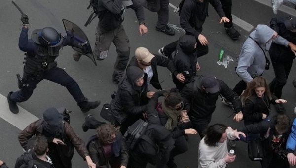 Citizens flee from the police onslaught, France, March 28, 2023.