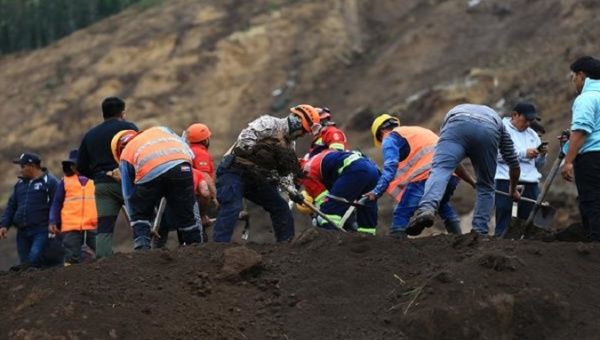 Citizens and rescue teams search for avalanche victims in Alausi, Ecuador, March 28, 2023. 