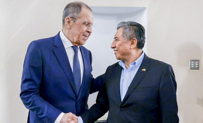 Russian FM Sergei Lavrov (L) and Bolivian FM Rogelio Mayta, Caracas, Venezuela, April 19, 2023.