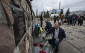 Nuclear power plant workers laying flowers at a monument to the victims of the Chernobyl accident. Apr. 27, 2023.