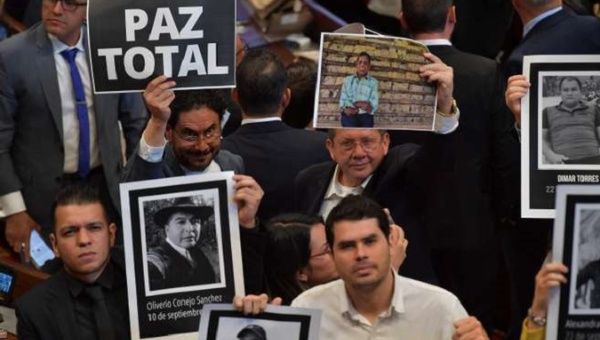 Colombians Hold Photos of People Missing at Pro-Peace Rally.